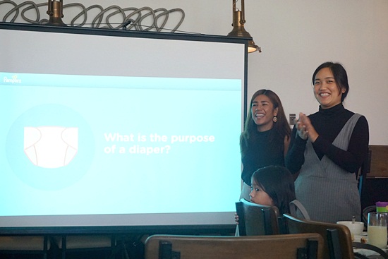 The Pampers team's presentation about recent studies of diaper usage in the Philippines and the purpose of diapers.