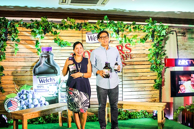 Erika Rodriguez of GEMCo, Philippine Marketing Agent of Welch's International and LucioCochanco, president of Fly Ace Corporation, distributor of Welch's 100% Grape Juice
