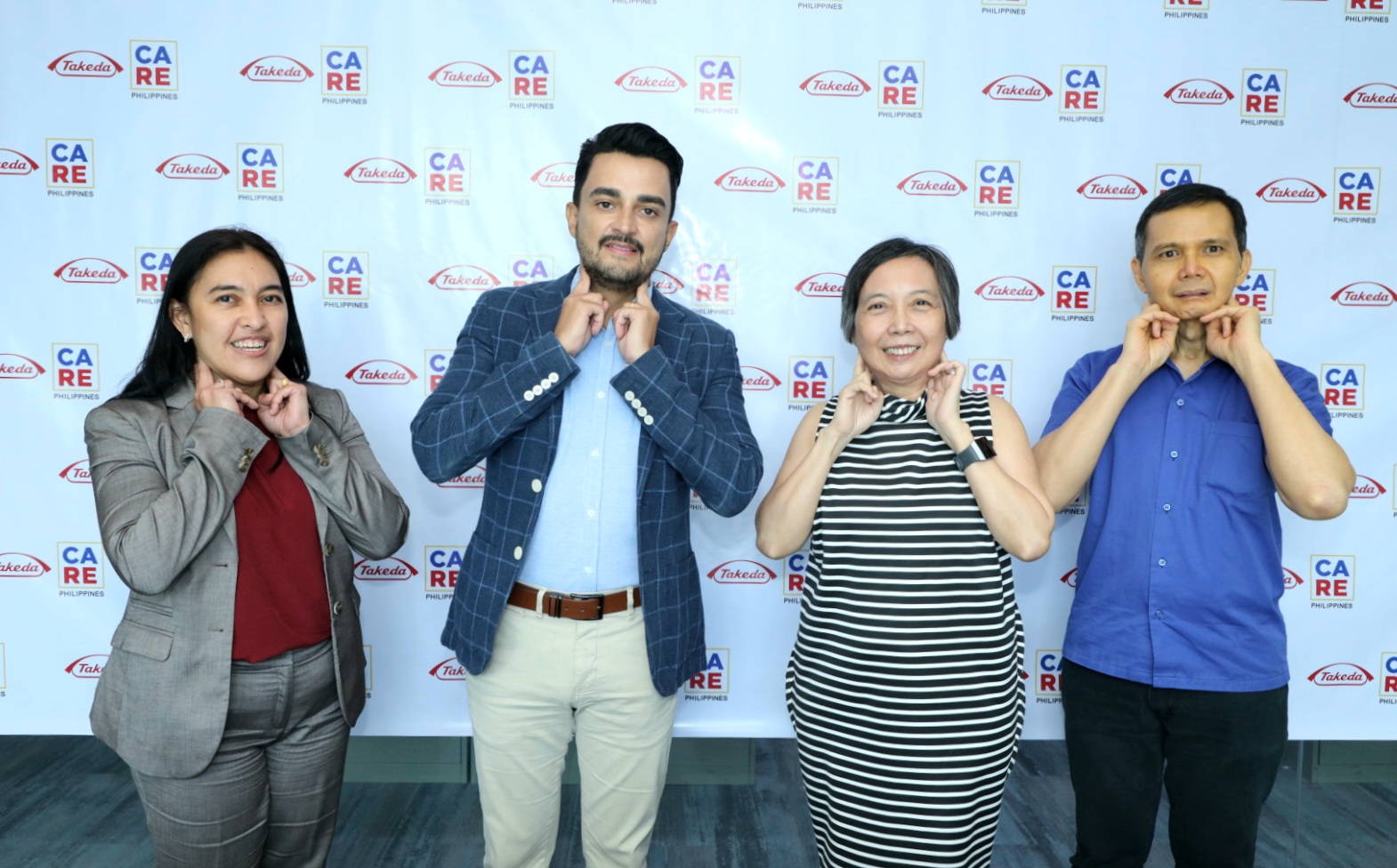 Representatives from Takeda Philippines and Care PH doing the symbolic gesture of Takeda’s Spot Lymphoma, Stop Lymphoma campaign. (From left to right) Loreann Villanueva, Country Manager, Takeda Philippines; Igor Gomes, Cluster Head and General Manager, VMAPS; Dr. Beatrice Tiangco, Founder of Care PH; and Mr. Jojo Flores, Program and Administrative Officer of Care PH