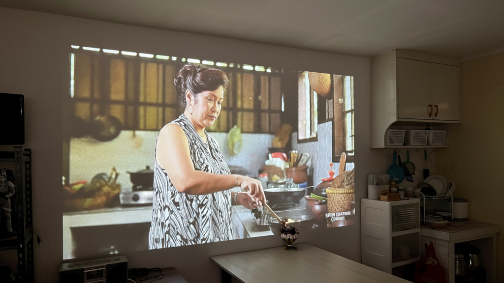 LUMOS Daystar projector streaming video content for everyday family viewing