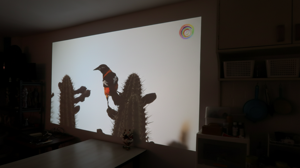 LUMOS Daystar projector projecting a bright movie image suitable for family viewing